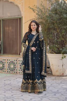 Purple Faux Georgette Gown With Embroidered Sequins And Zari Work