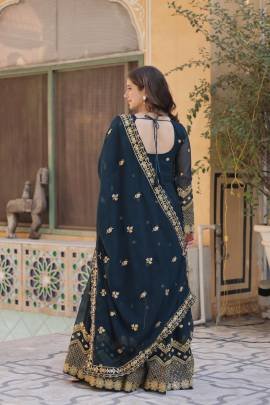 Purple Faux Georgette Gown With Embroidered Sequins And Zari Work